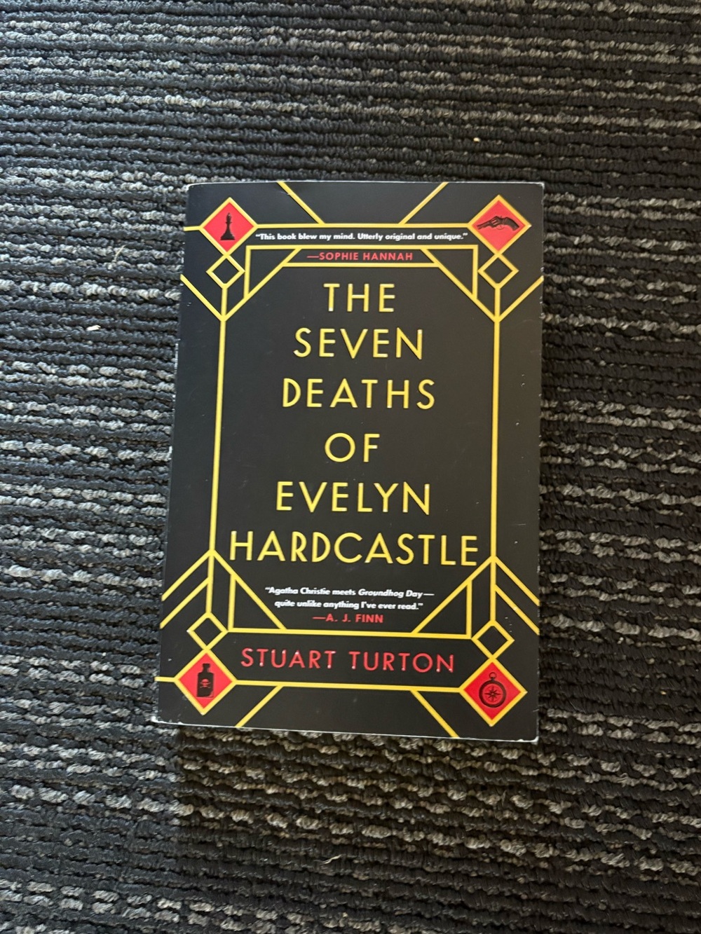 The Seven Deaths of Evelyn Hardcastle by - Black and Gold Cover